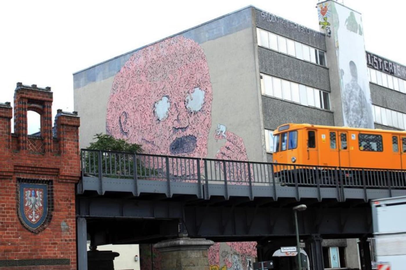 BLU's Pink Man mural at Falckensteinstraße near the Oberbaumbrücke, Berlin